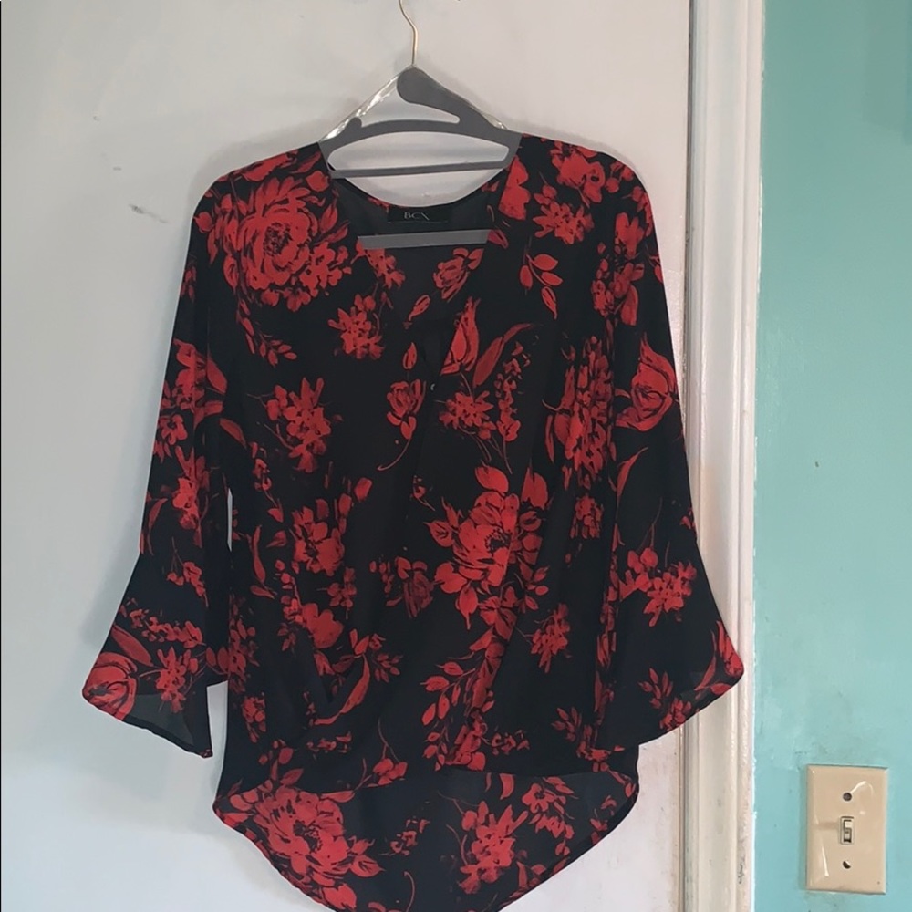 Black blouse with red flowers